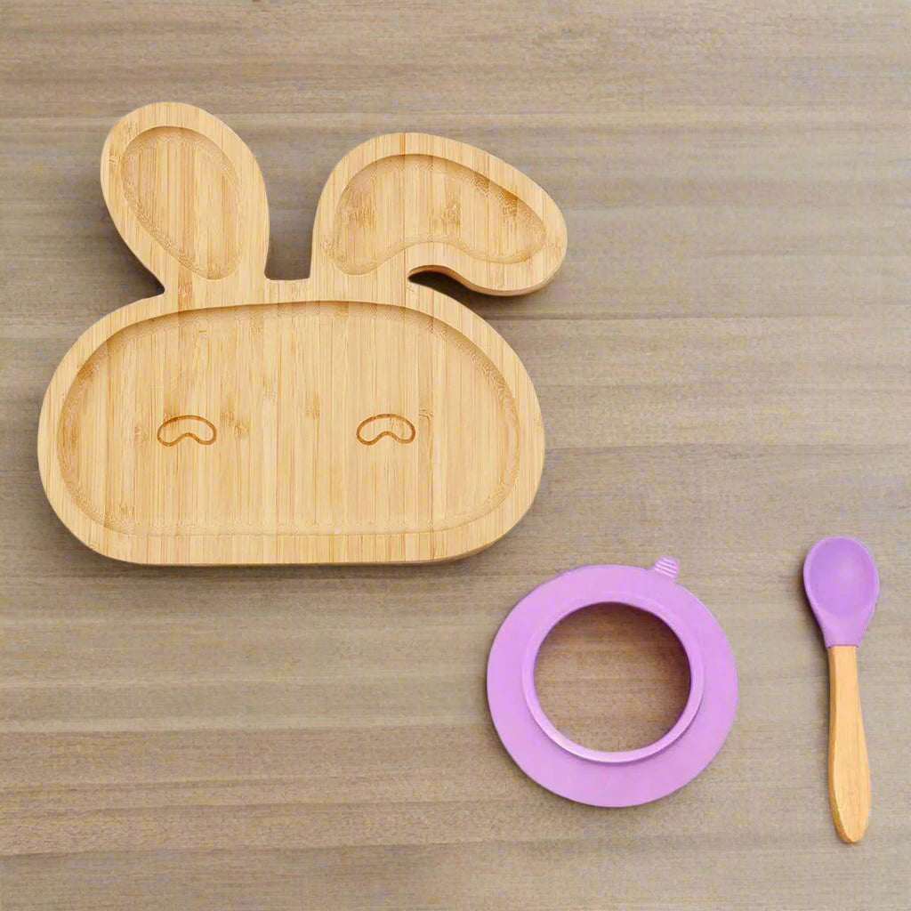 Bamboo baby bowl with suction base and matching spoon. Non-toxic, BPA-free, and eco-friendly, ideal for baby-led weaning and mess-free meals